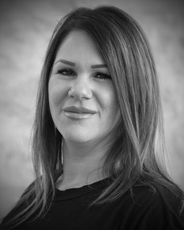 Professional monochrome headshot of a female solicitor working at Harbour.