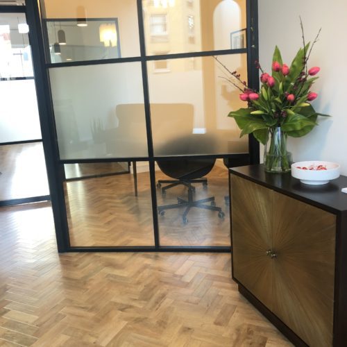 A warm office hallway.