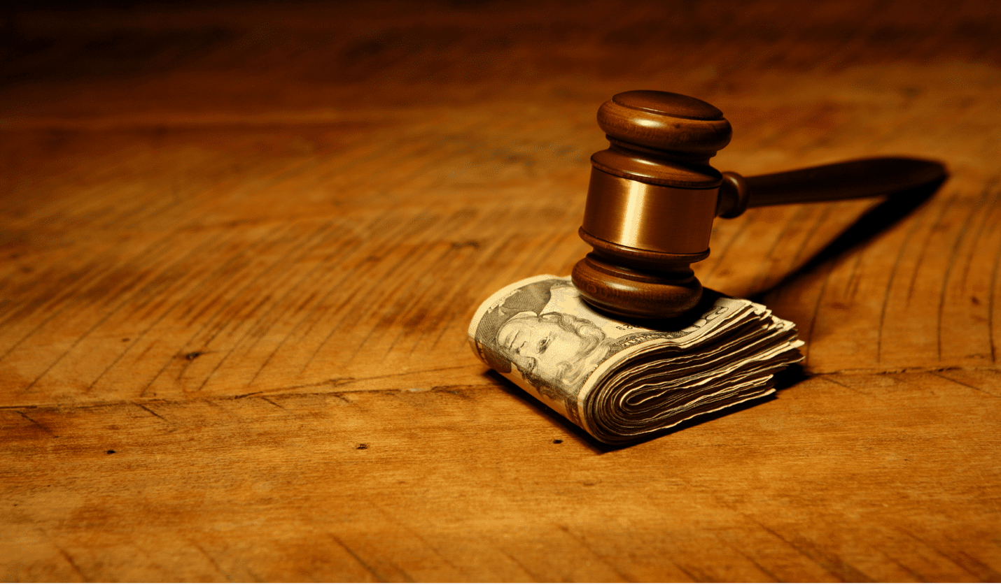 Gavel on a stack of money