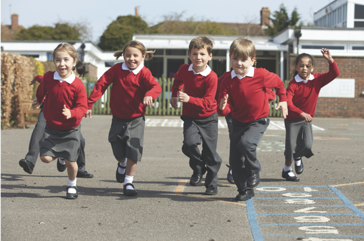 Primary school children having fun on the playground.